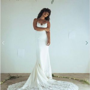 I am selling my beautiful lacy Ivory/white non tailored size 4 wedding gown.